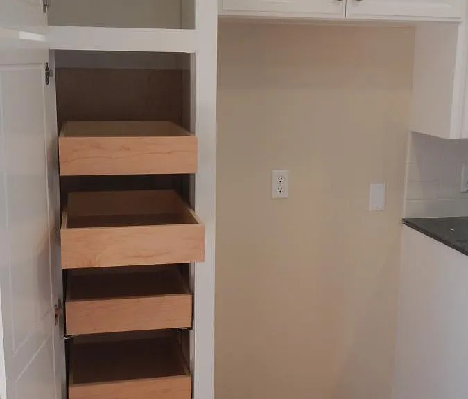 2nd cabinet pantry with roll out drawers