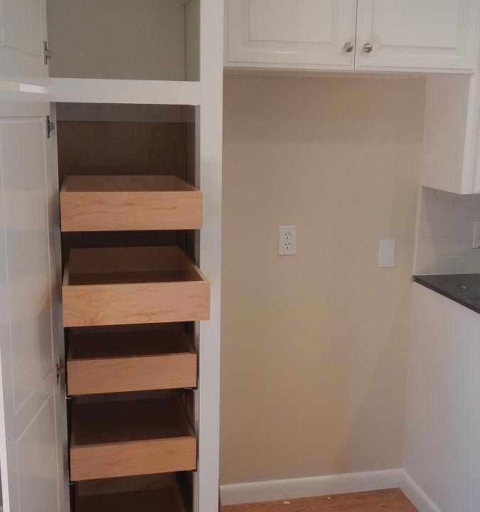 2nd cabinet pantry with roll out drawers