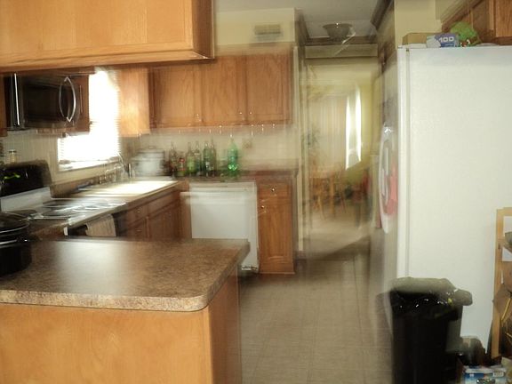 4th image of 5429 Grand Lake Cres