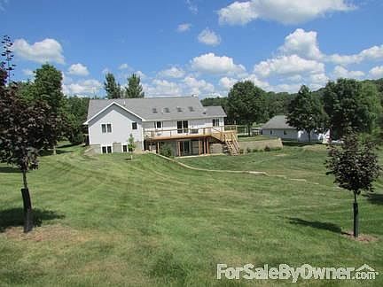Backyard
						:
						landscaped with mature trees