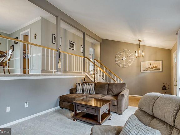 Features vaulted ceilings and updated fixtures