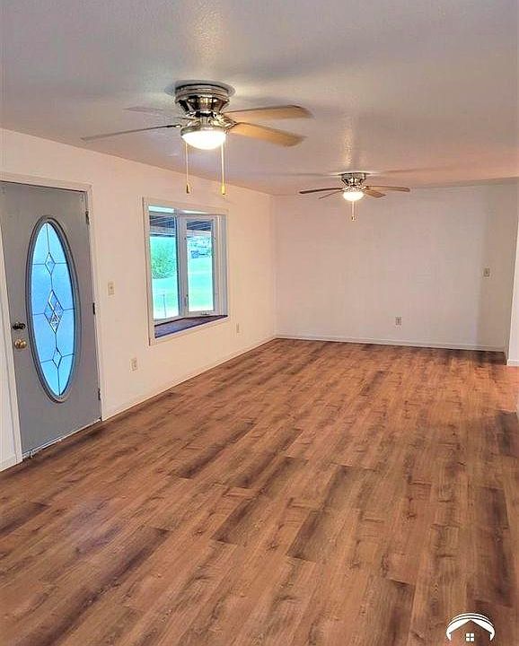 Large living room with bay window.