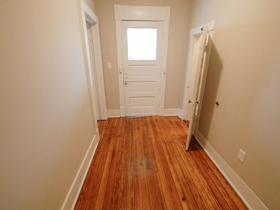 Hallway to Front Porch and Storage Closet