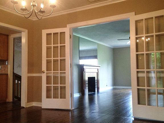 Dining room with French divided light doors.