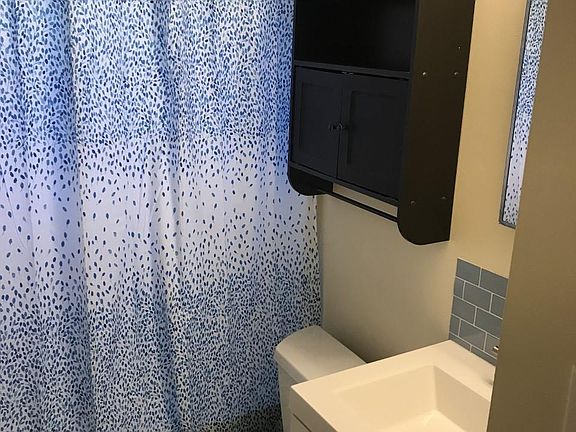 Bath - new toilet, vanity, shower curtain, and all hardware
