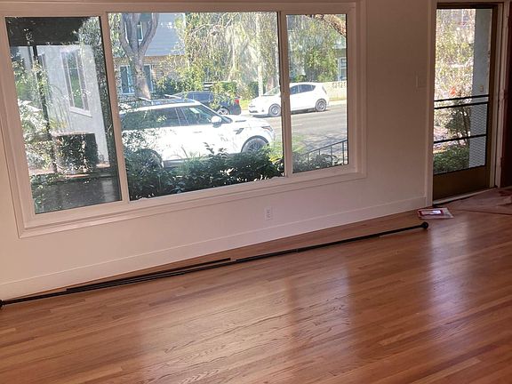 Window looking out from the large living room space.