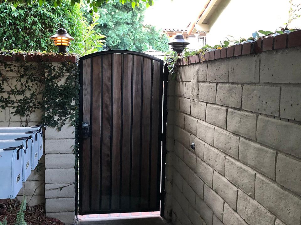 Front gate to cottage and 3 back units