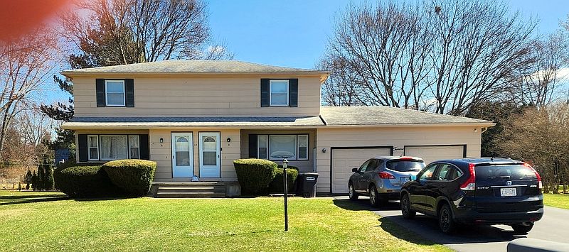 Side by Side Duplex with two car attached garage