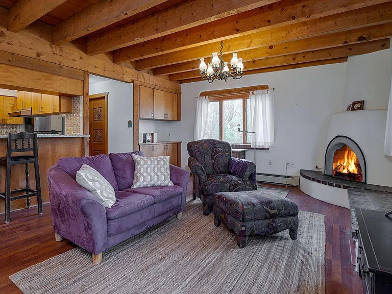 Family room with kiva fireplace