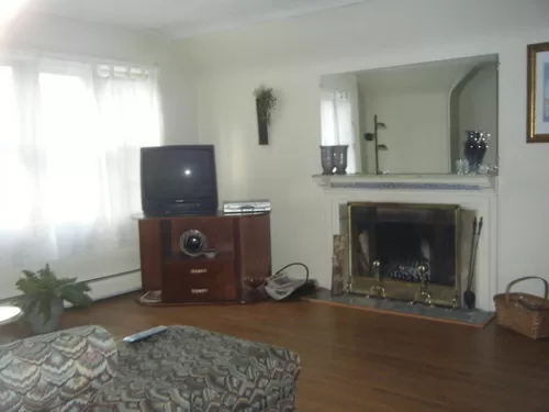 living room with fireplace - 1833 Kensington Ave #2