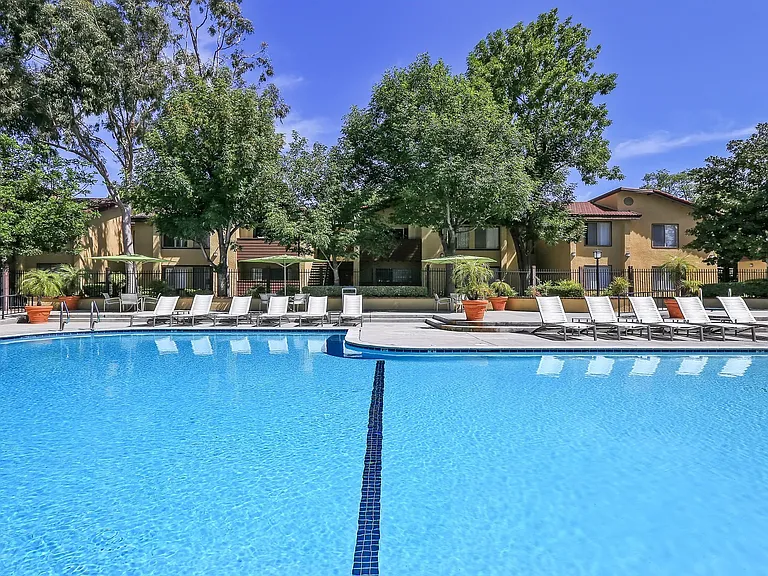 Lounge on the sundeck beside our outdoor pool