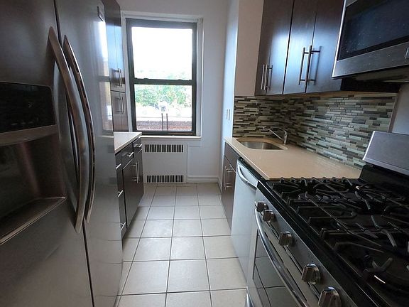 3rd image of 63-45 Wetherole St #4