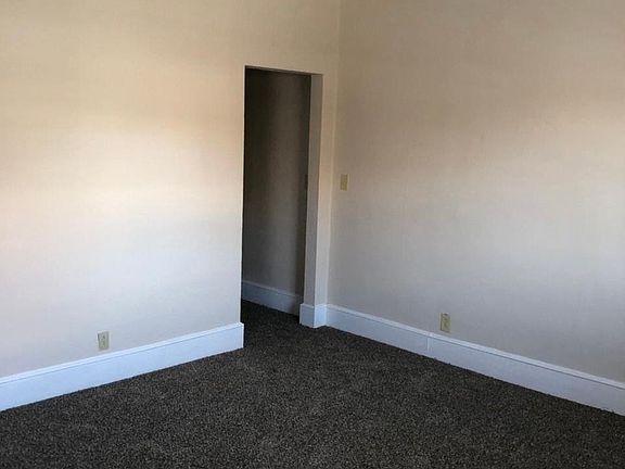 Living room looking toward the hallway to kitchen and bedroom