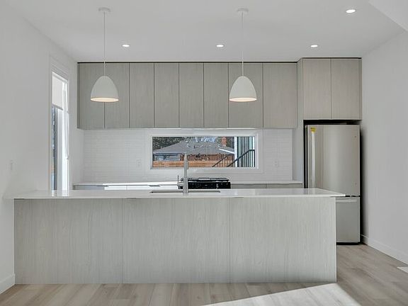 5th image of 10969 130th St NW Unit 1