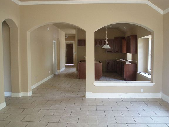 Tile floors in entry, kitchen, family and all bathrooms. Granite countertops