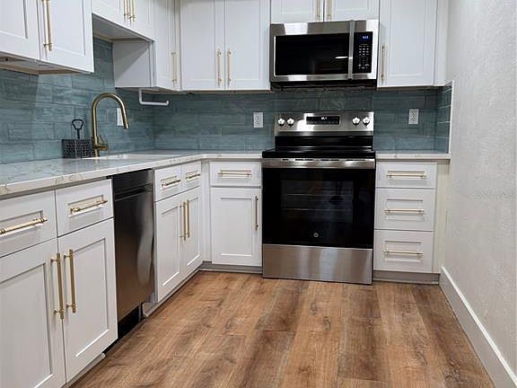 5th image of 1001 77TH AVENUE N #102