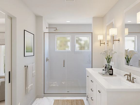 Primary bath with glass shower enclosure