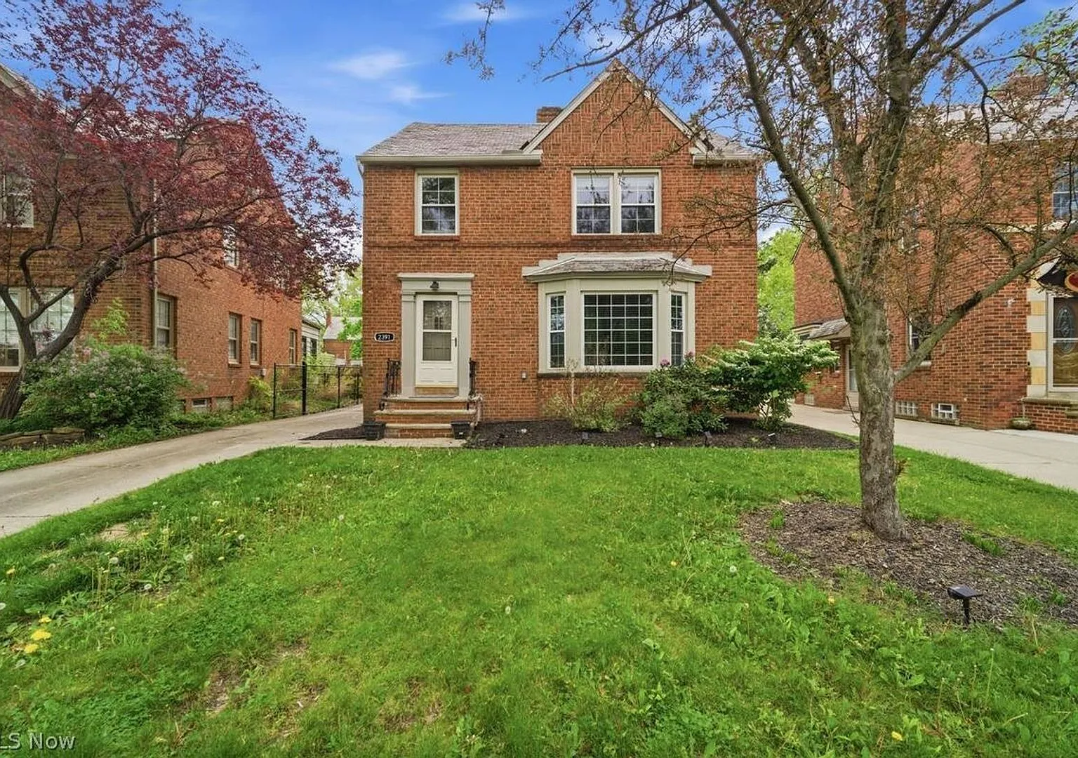 Beautiful 4-Bedroom Brick Colonial in University Heights — Photo 1