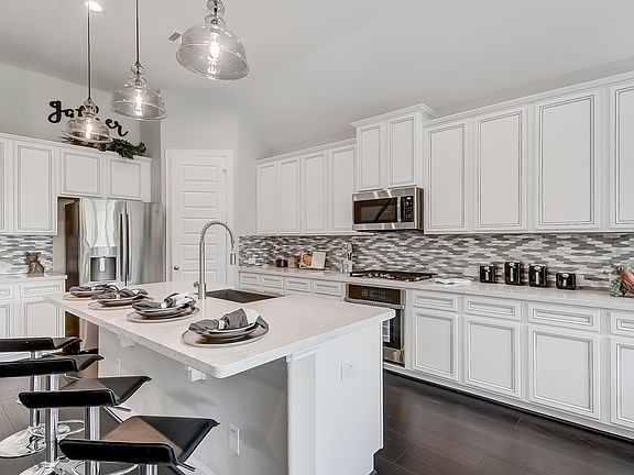 Kitchen with corner pantry