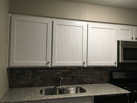 granite counters, custom shaker style cabinet doors with sof