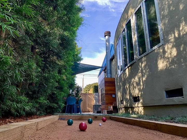 Bocce and cornhole court - so fun