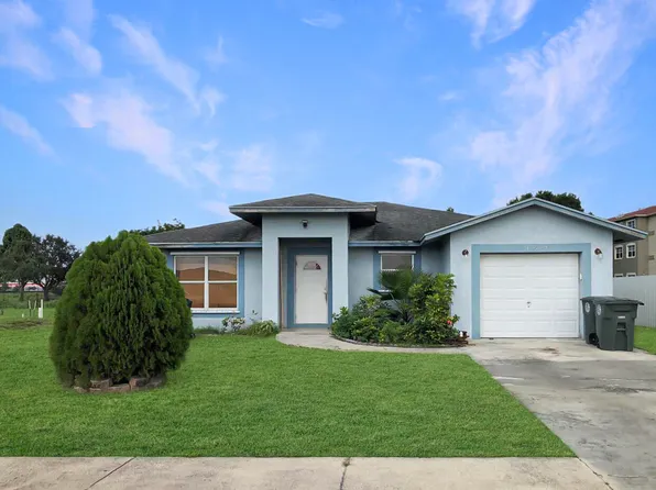 157 Dabou Loop, Belle Glade, FL 33430