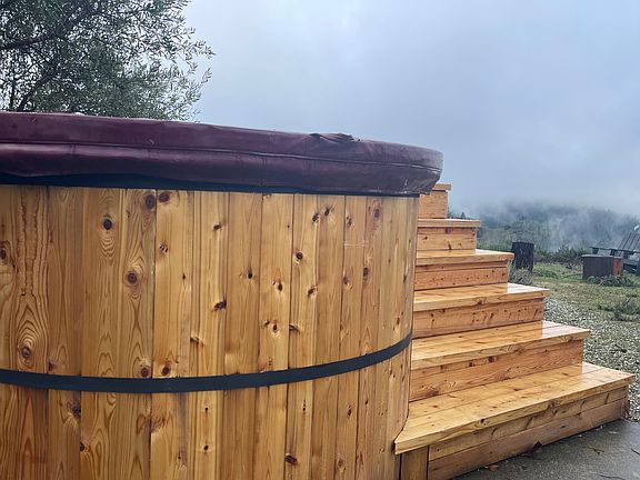 Newly clad cedar hot tub.