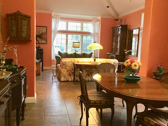 dining room and sitting room looking to front of house, off