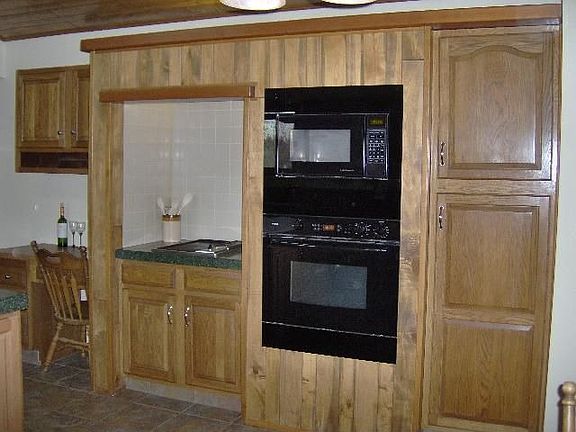 Bosch wall over, built-in microwave & Jenn-air downdraft griddle/grill.