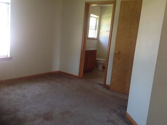 Master bedroom with full bath and large walk-in closet.