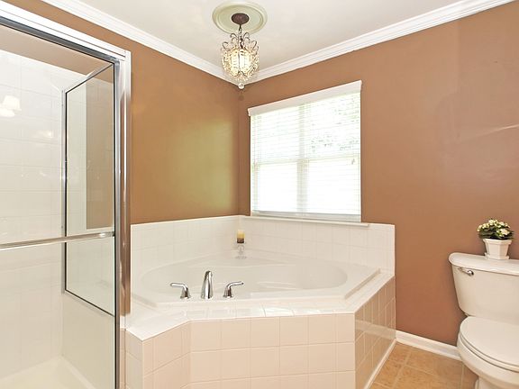 Garden tub with chandelier