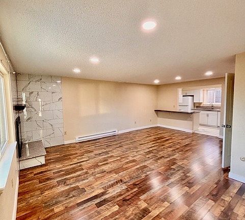 Main floor living room with kitchen