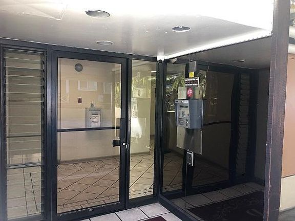 Secured entrance with phone entry system