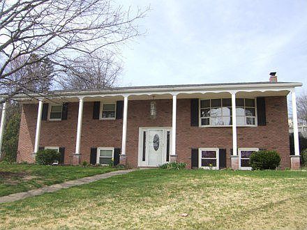 Large lot and nicely landscaped with fish pond and privacy fence