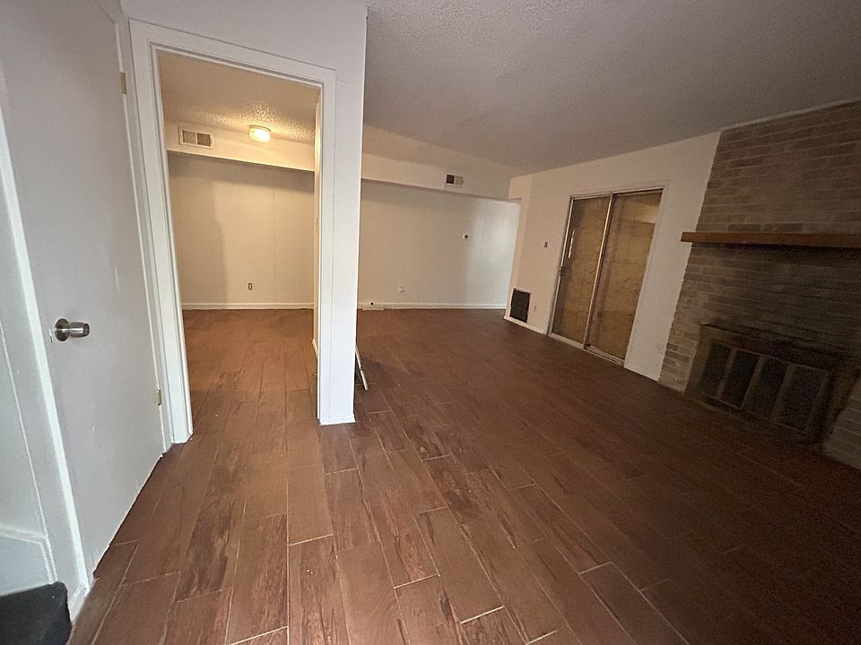 Downstairs living room with fireplace