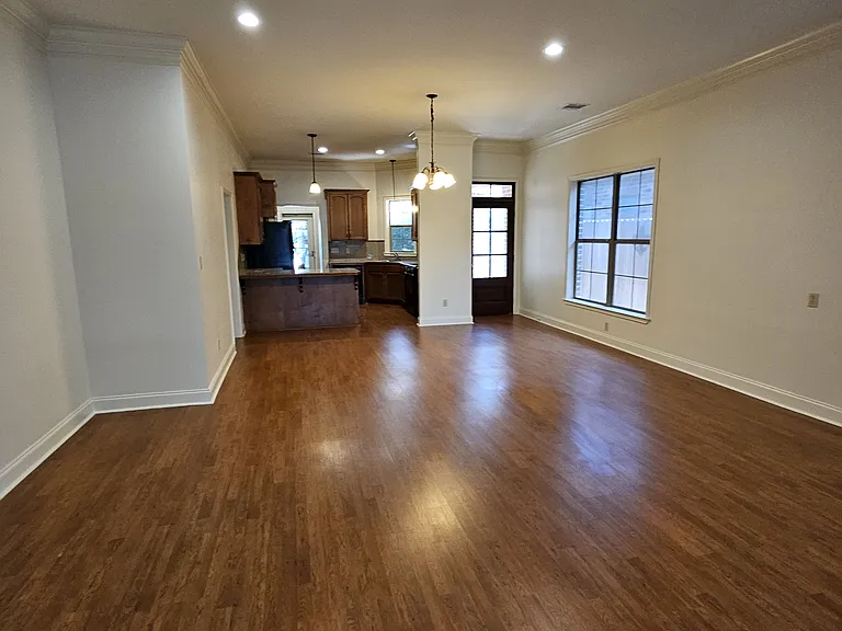 View of living room, dining room & kitchen