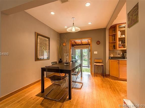 Charming bungalow on a quiet, tree-lined, cul-de-sac street in prestigious North Coconut Grove