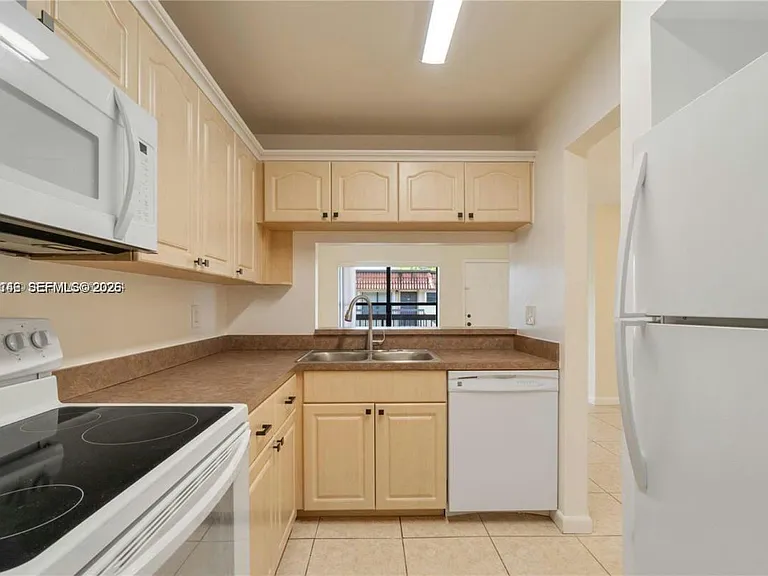561 NW 100th Pl #201 — Photo 14