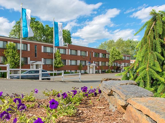 Arrive home to beautifully landscaped surroundings at Country Manor, where charm meets comfort and means you are home.