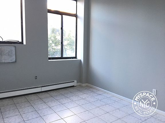 5th image of 714 Seneca Ave APT 203