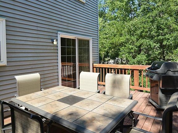 Outdoor Grilling Deck Under Shade Tree Umbrellas