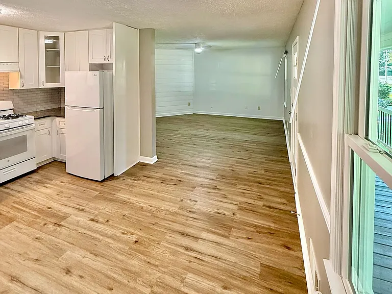 Seamless open layout_ - connects kitchen to living area for effortless entertaining and family time - gas range, dishwasher and ample storage simplify daily cooking for relaxed weeknight dinners