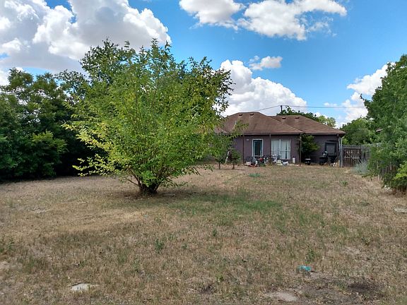 Back yard ... all tress and brush have all been cut ...not all shown here