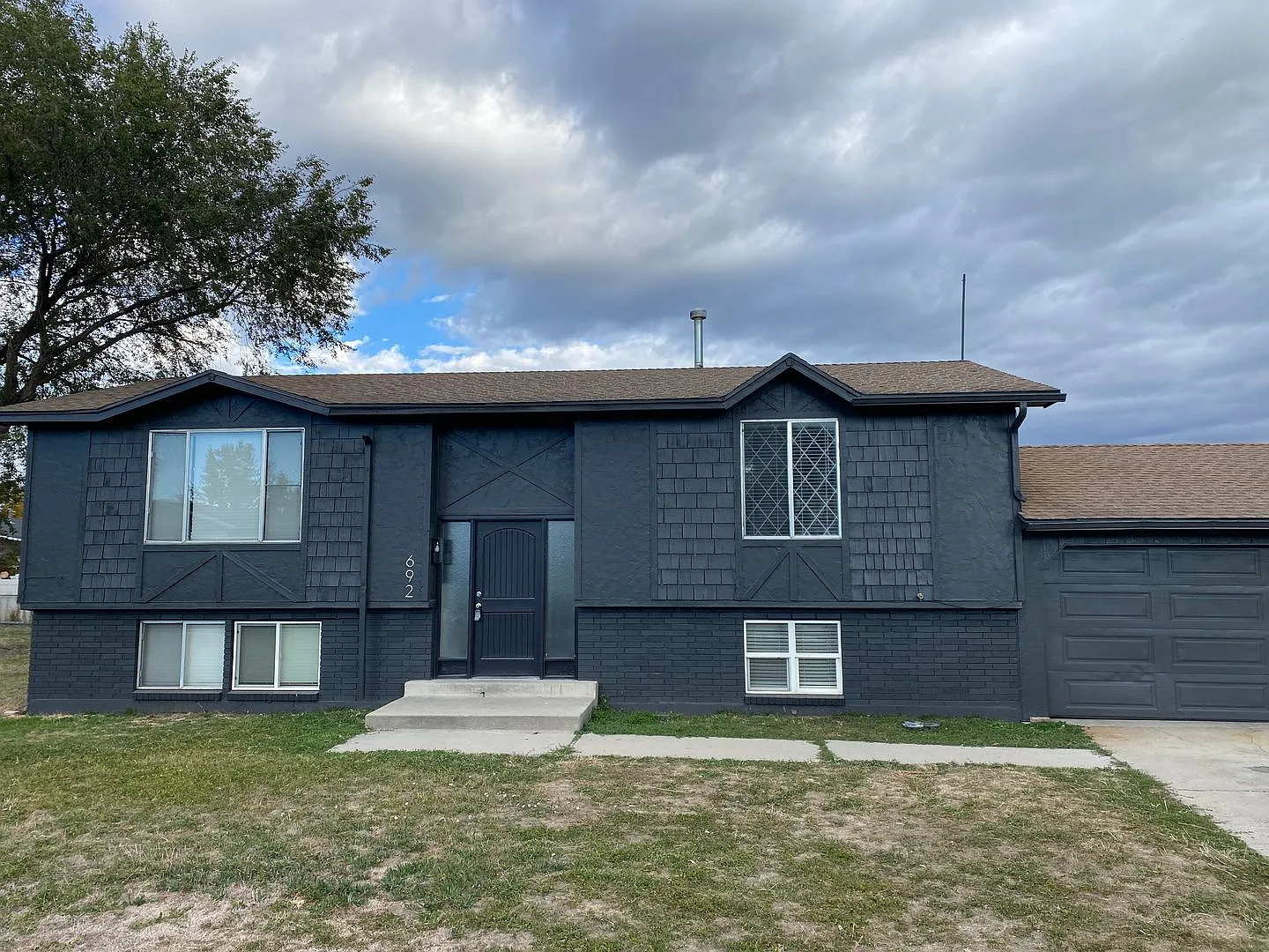 Updated 4-Bedroom Home with Huge Backyard & 2-Car Garage — Photo 1