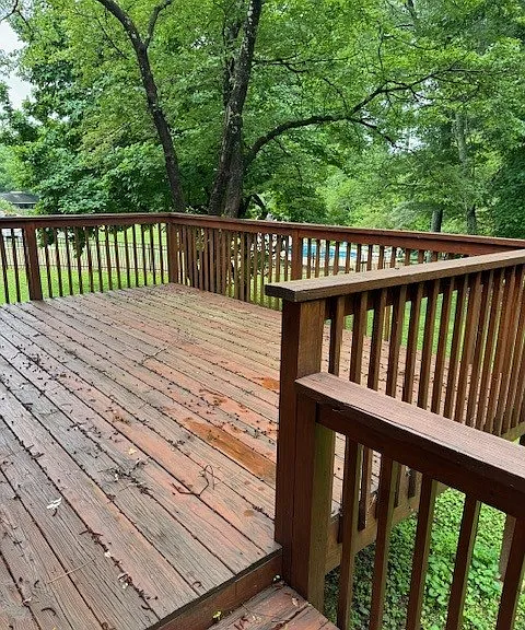 Rear deck overlooking large private backyard