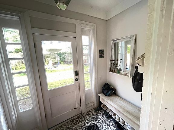 mudroom from back yard to kitchen