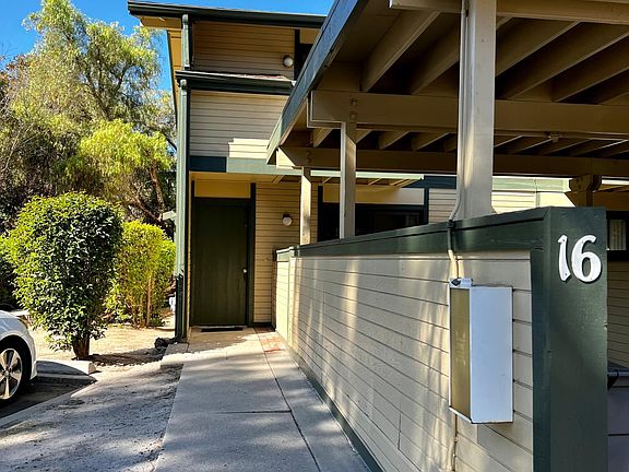 Reserved car space to left of front door.