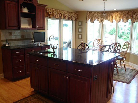 Granite counters, cherry cabinets, HW floors
