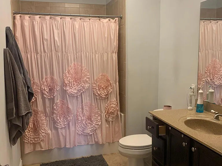 Primary Bathroom off of Primary suite, tub and shower