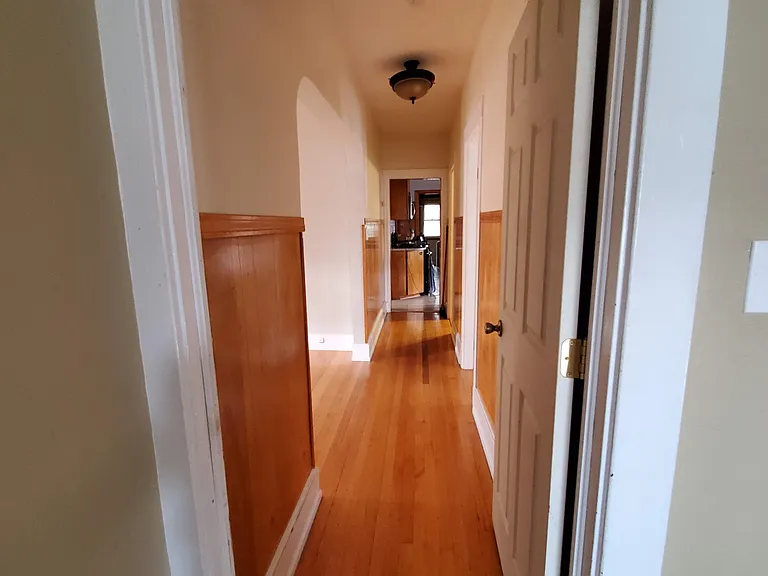 Entry to unit; shared with 3rd floor unit